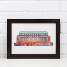 Load image into Gallery viewer, A detailed Liverpool Football print of the Anfield stadium. The piece is painting in watercolour and fineliner and signed by the artist. It&#39;s photographed in a white frame.
