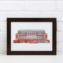 Load image into Gallery viewer, A detailed Liverpool Football print of the Anfield stadium. The piece is painting in watercolour and fineliner and signed by the artist. It's photographed in a white frame.