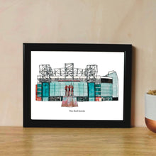 Load image into Gallery viewer, A Manchester United Print. The pieces is a pen and watercolour painting of the Old Trafford football stadium, photographed against a plaster wall.