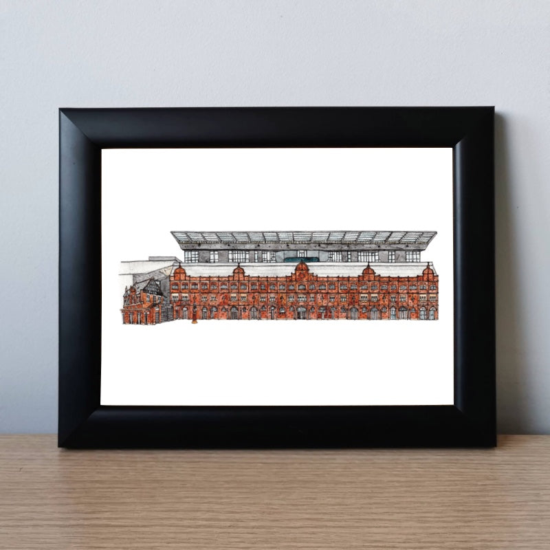 A framed pen and watercolour print of Craven Cottage home to Fulham FC by Jessica Sian
