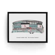 Load image into Gallery viewer, A framed print of The Emirates Football Stadium, home to Arsenal FC. The piece is personalised with the words &#39;Arsenal Football Club - The Emirates Stadium&#39; printed underneath, it is in a black frame.
