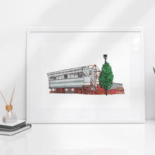Load image into Gallery viewer, Nott&#39;m Forest FC wall art. The piece is printed from Jessica Sian&#39;s original illustration of the City Ground. Photographed in a white frame on a white desk.
